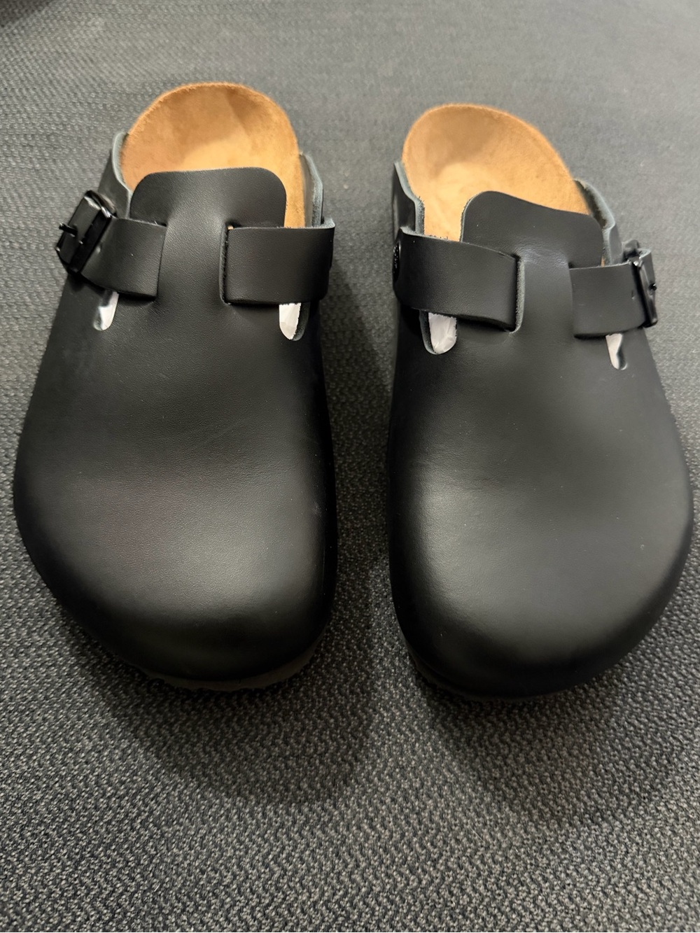 Birkenstock Black Slip-On Buckle Clogs